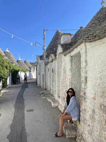 Against a trullo wall in Alberobello, Puglia