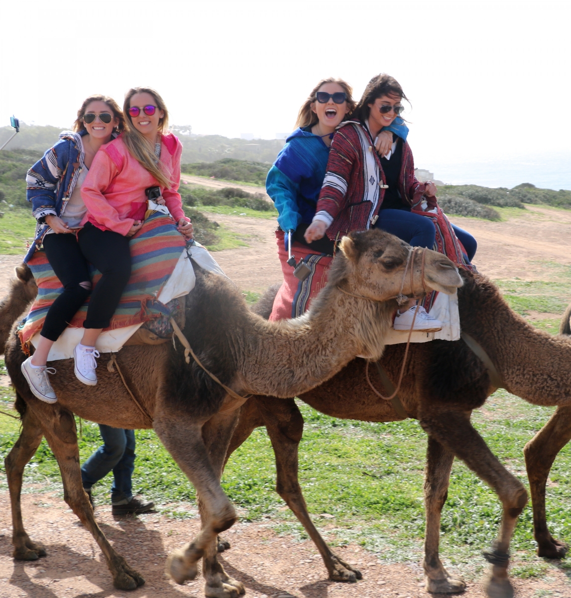 Niki, Ashley, Katie, and I riding camels in Tangier